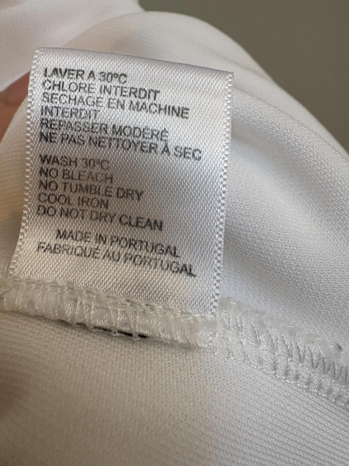 Joseph Asymmetric Minimalist Sleeveless Top in White. Size Small S